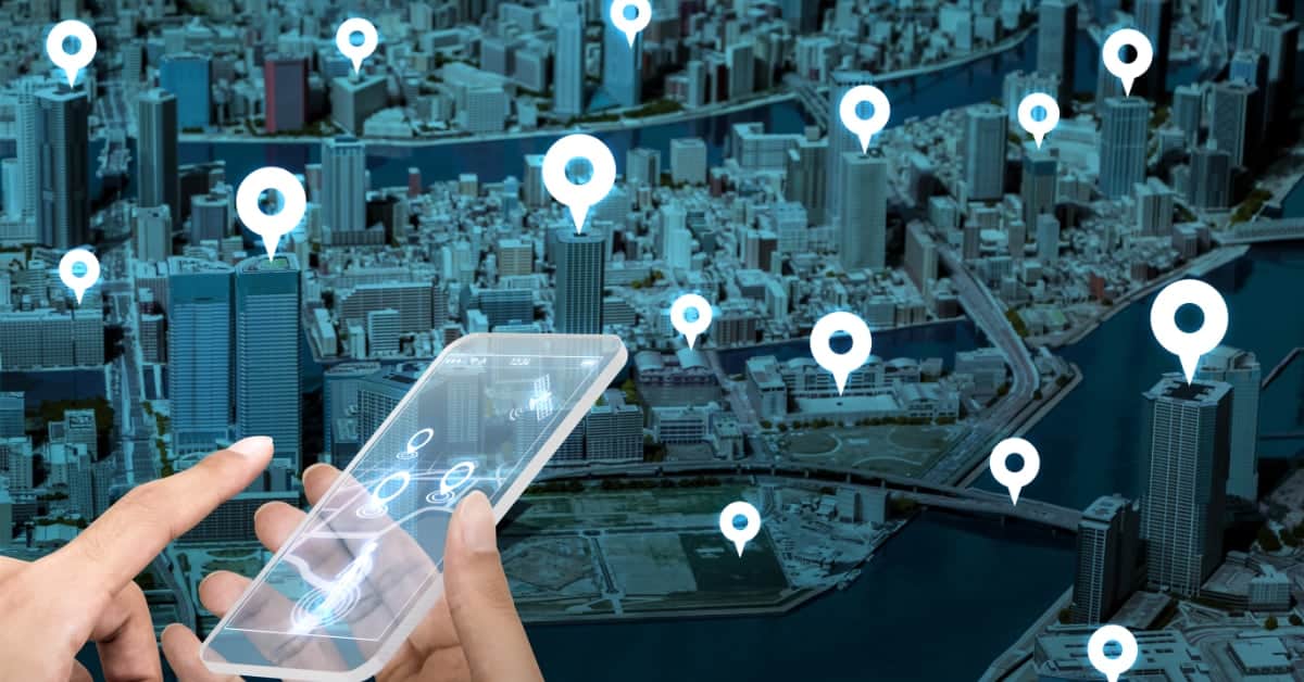 Urban city with digital map markers and smartphone for social media engagement.