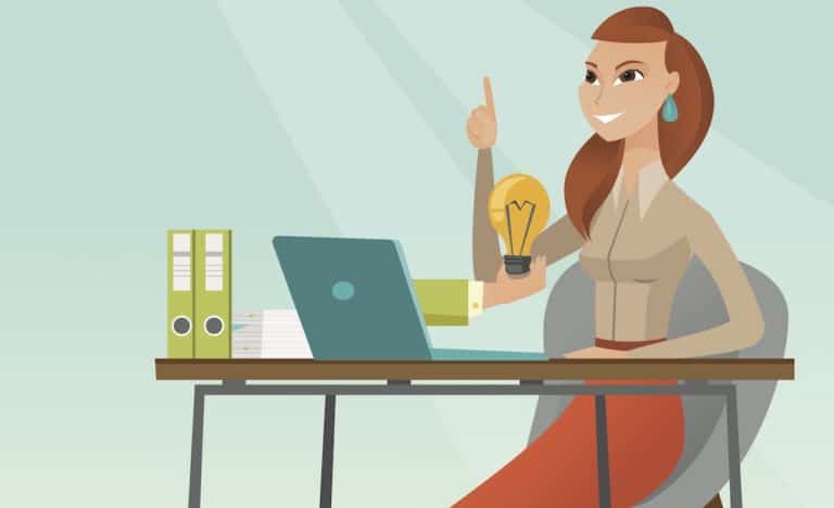 Woman brainstorming marketing ideas with a lightbulb, laptop, and files on her desk.