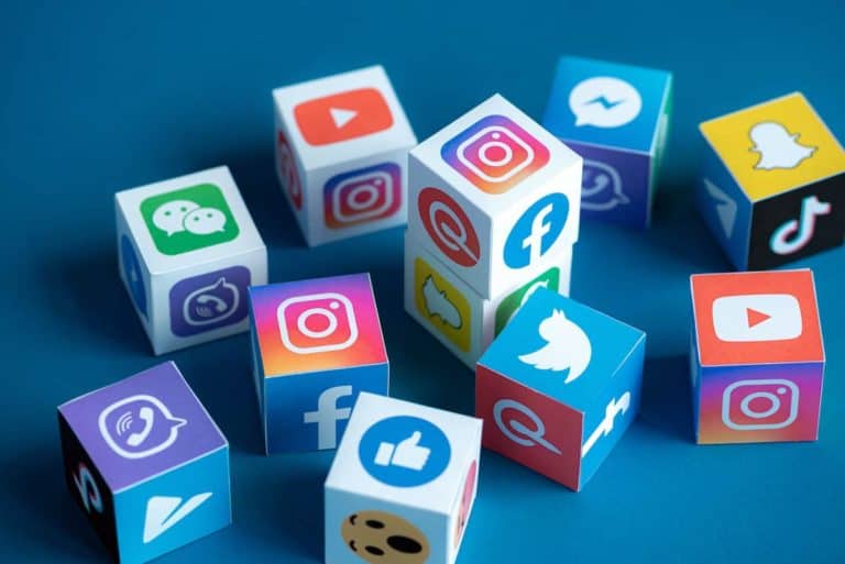 Colorful social media icons on cubes representing digital marketing trends.